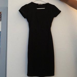 Bodycon black dress with open back